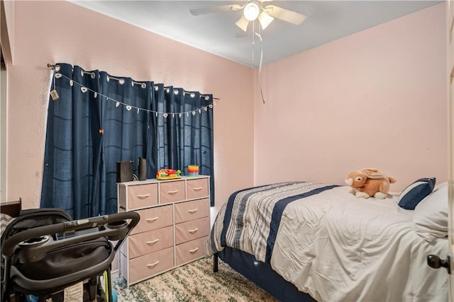 bedroom featuring carpet flooring and ceiling fan