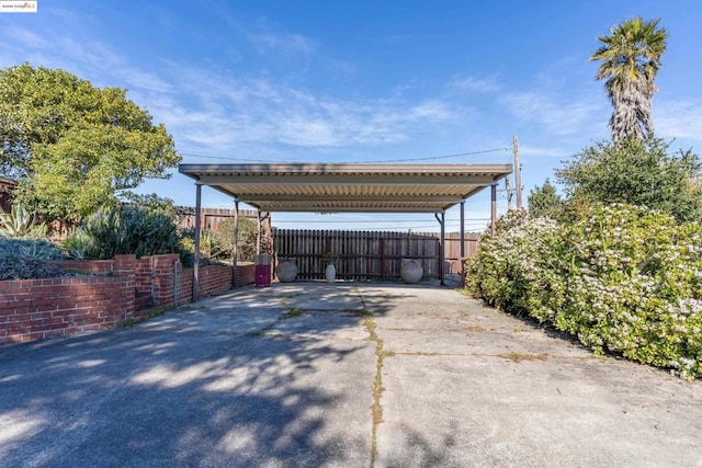 view of car parking with a carport