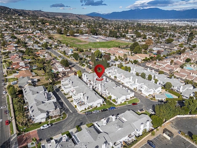 drone / aerial view featuring a mountain view