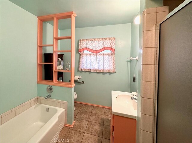 full bathroom featuring tile patterned floors, vanity, toilet, and shower with separate bathtub