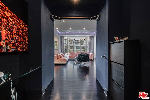 hall with dark hardwood / wood-style floors