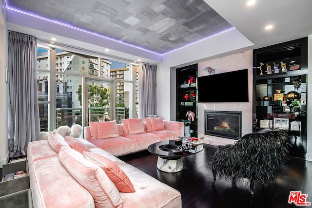 living room featuring hardwood / wood-style floors and a fireplace