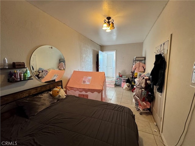 bedroom with light tile patterned flooring