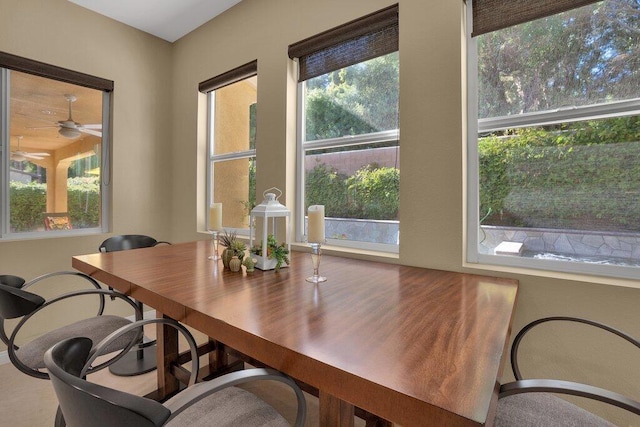 dining area featuring ceiling fan