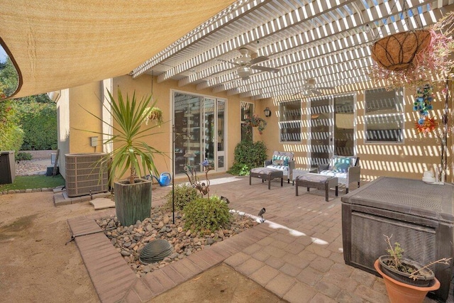 view of patio / terrace with central air condition unit, a pergola, and ceiling fan