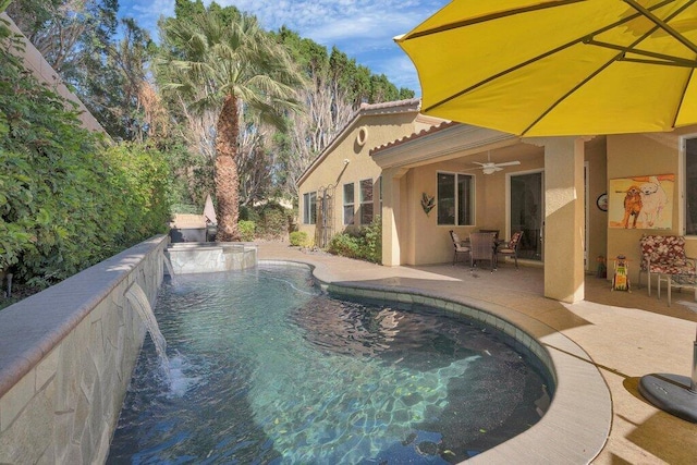 view of pool featuring a patio area and ceiling fan