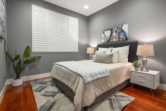 bedroom featuring hardwood / wood-style flooring