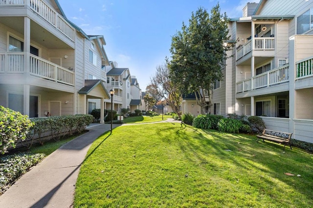 view of community with a yard