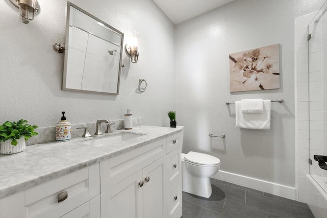 bathroom featuring toilet, tile patterned floors, and vanity