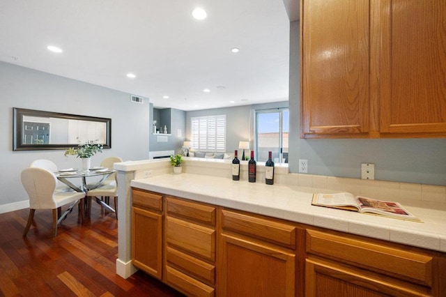 kitchen featuring dark hardwood / wood-style flooring