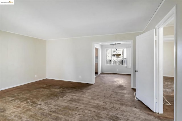 spare room featuring dark hardwood / wood-style flooring