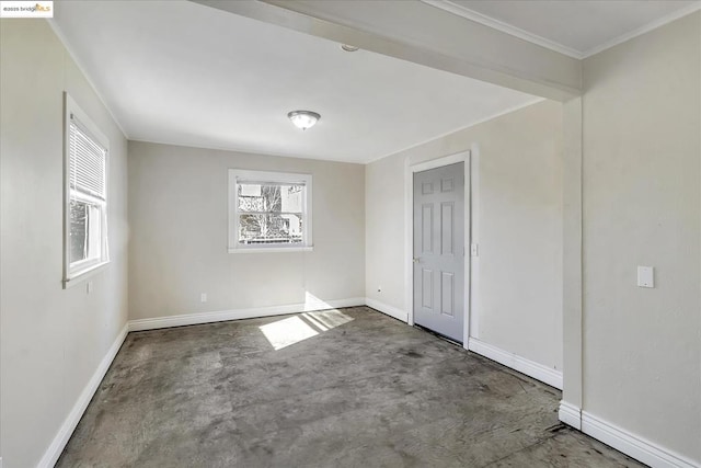 unfurnished bedroom with concrete flooring