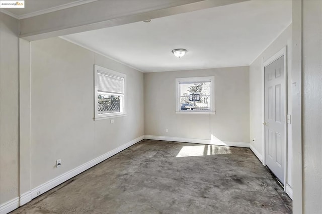 unfurnished bedroom featuring crown molding