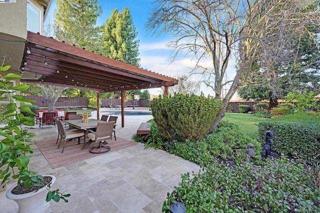 view of patio with a fenced in pool