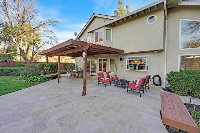 exterior space featuring an outdoor hangout area and a pergola