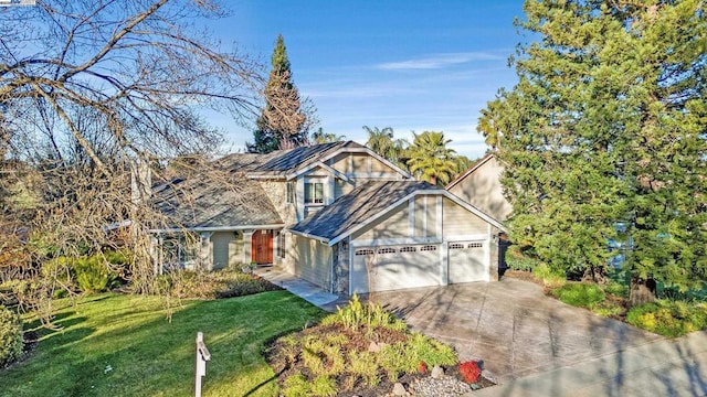 view of front facade featuring a front yard and a garage