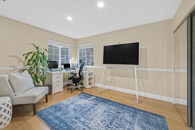 office space featuring light hardwood / wood-style floors