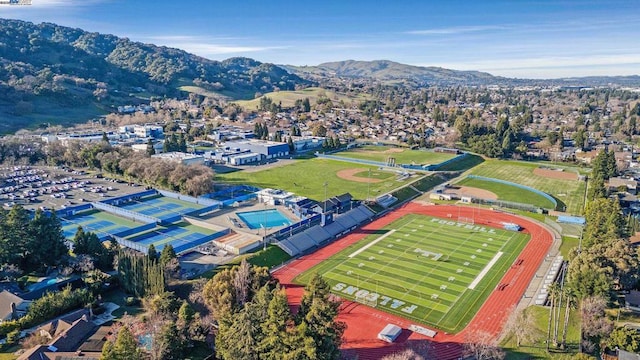 birds eye view of property featuring a mountain view