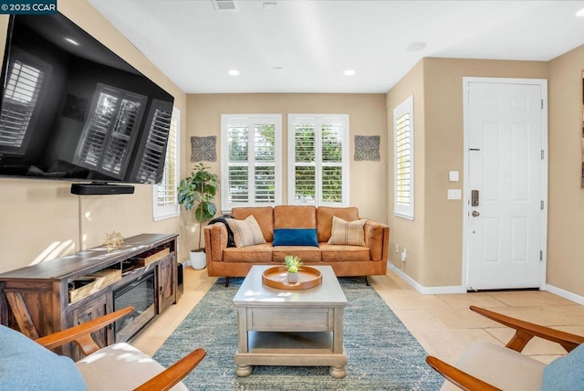 living room featuring light tile patterned flooring