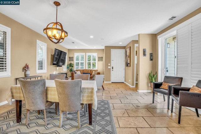 dining room with an inviting chandelier