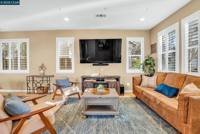 living room featuring a wealth of natural light