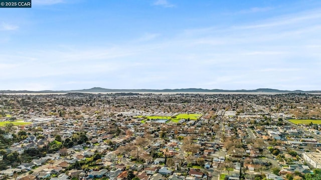 drone / aerial view featuring a mountain view