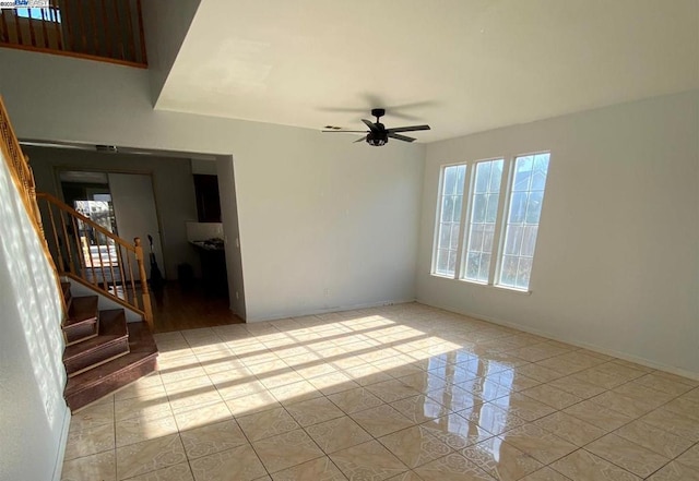 spare room with ceiling fan