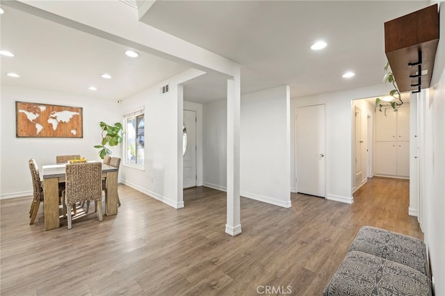 dining room with hardwood / wood-style floors