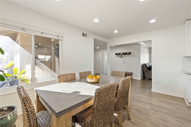 dining room featuring hardwood / wood-style floors