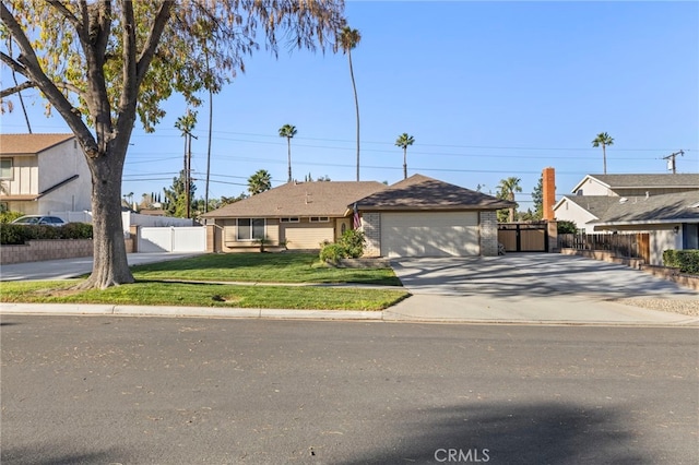 ranch-style house with a front yard and a garage