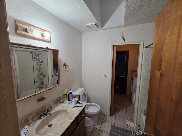 full bathroom featuring shower / bath combination with curtain, tile patterned floors, vanity, a textured ceiling, and toilet