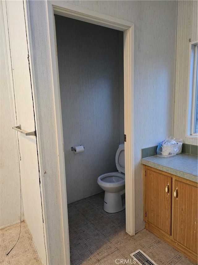 bathroom featuring toilet