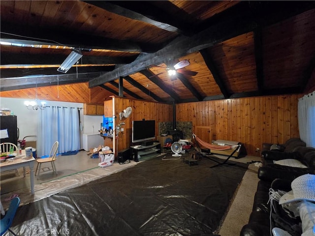 garage with black fridge, wooden walls, and wooden ceiling