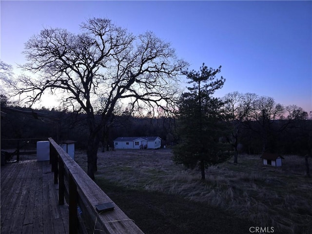 view of deck at dusk