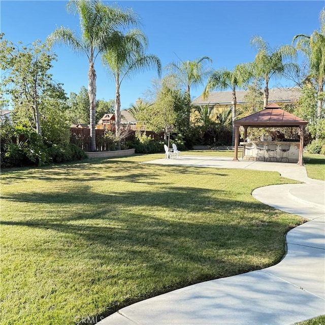 view of yard featuring a gazebo and a patio