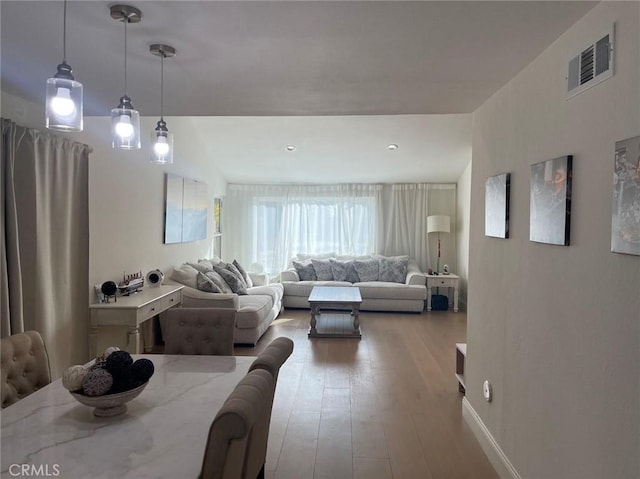 living room with hardwood / wood-style floors