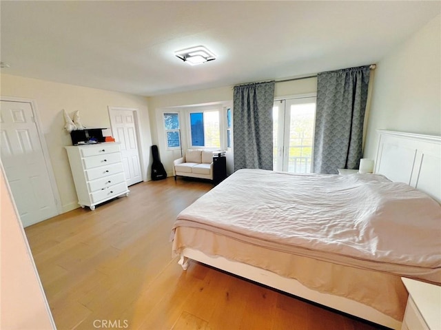 bedroom featuring light wood finished floors