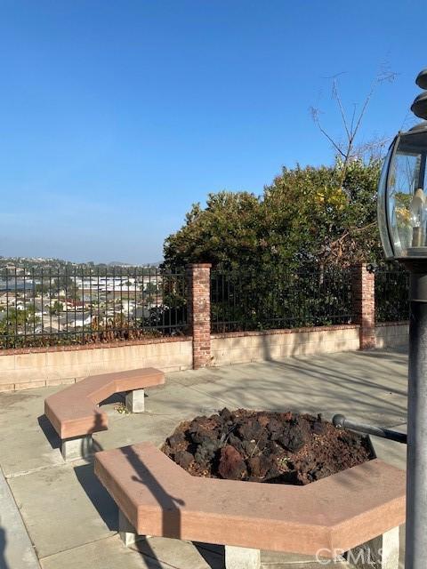 view of patio / terrace featuring fence