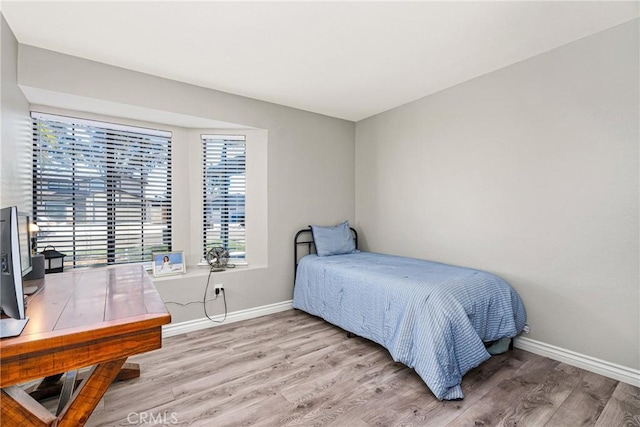 bedroom featuring light hardwood / wood-style flooring