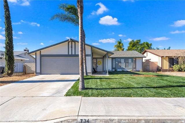 ranch-style home featuring a front yard and a garage