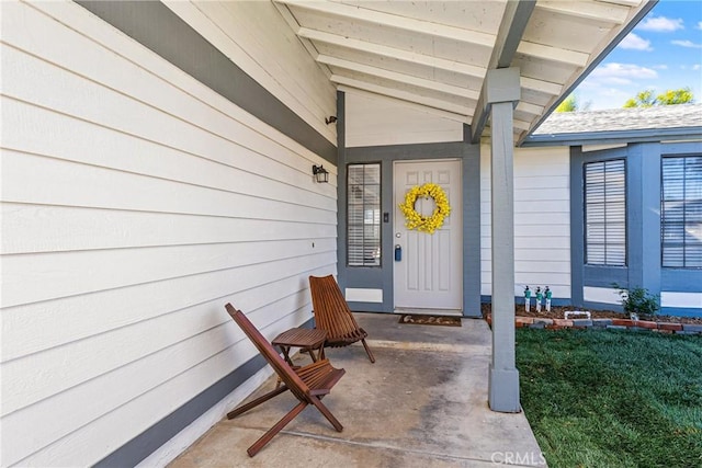 property entrance featuring covered porch