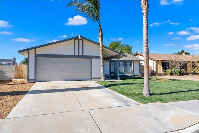 ranch-style house with a front lawn and a garage