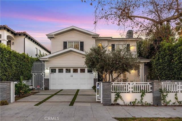 view of front of home with a garage