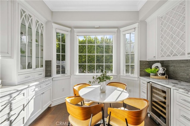 sunroom / solarium with bar area and wine cooler