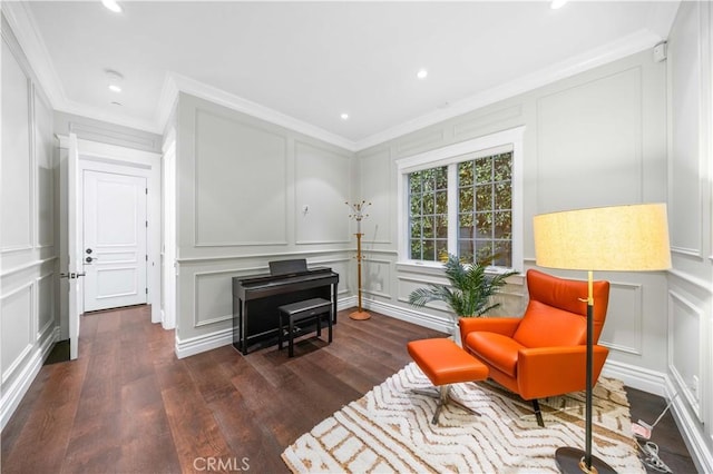 living area featuring ornamental molding and dark wood-type flooring