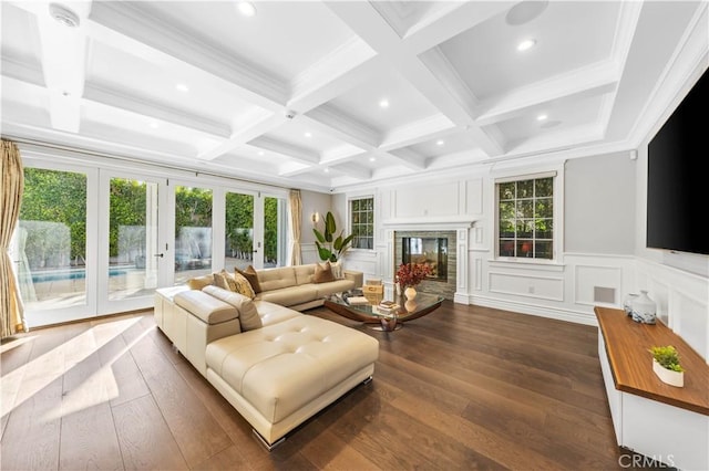 living room featuring beam ceiling, french doors, coffered ceiling, dark hardwood / wood-style floors, and ornamental molding