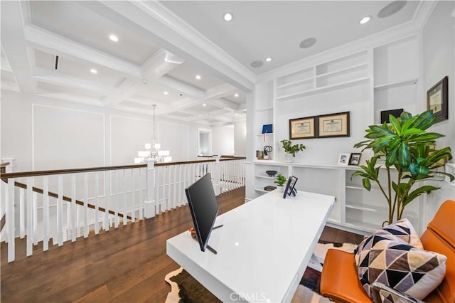 office area with coffered ceiling, crown molding, built in shelves, dark hardwood / wood-style floors, and beamed ceiling