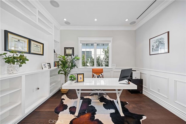 office area with built in shelves, crown molding, and dark wood-type flooring