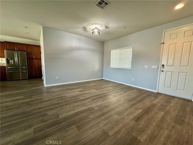 interior space with dark hardwood / wood-style flooring