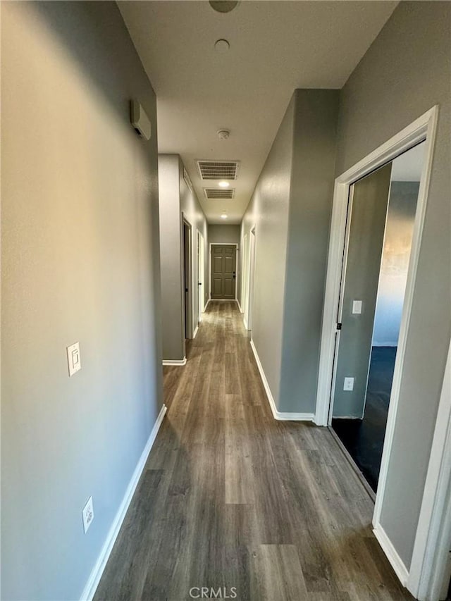 hall featuring dark hardwood / wood-style floors